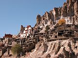 Annapurna 12 10 Braga Braga (3500m) is a Tibetan-style village of about 200 houses hiding behind a photogenic steep, eroded rock outcrop. The houses are stacked one atop the other, each with an open veranda formed by a neighbour�s rooftop. The gompa is perched on a high crag overlooking the village, and is estimated to be 400 to 500 years old. The gompa comprises three main buildings and belongs to the Kagyu sect of Tibetan Buddhism.